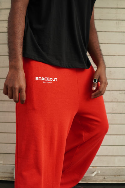 RED BAGGY TRACK PANTS